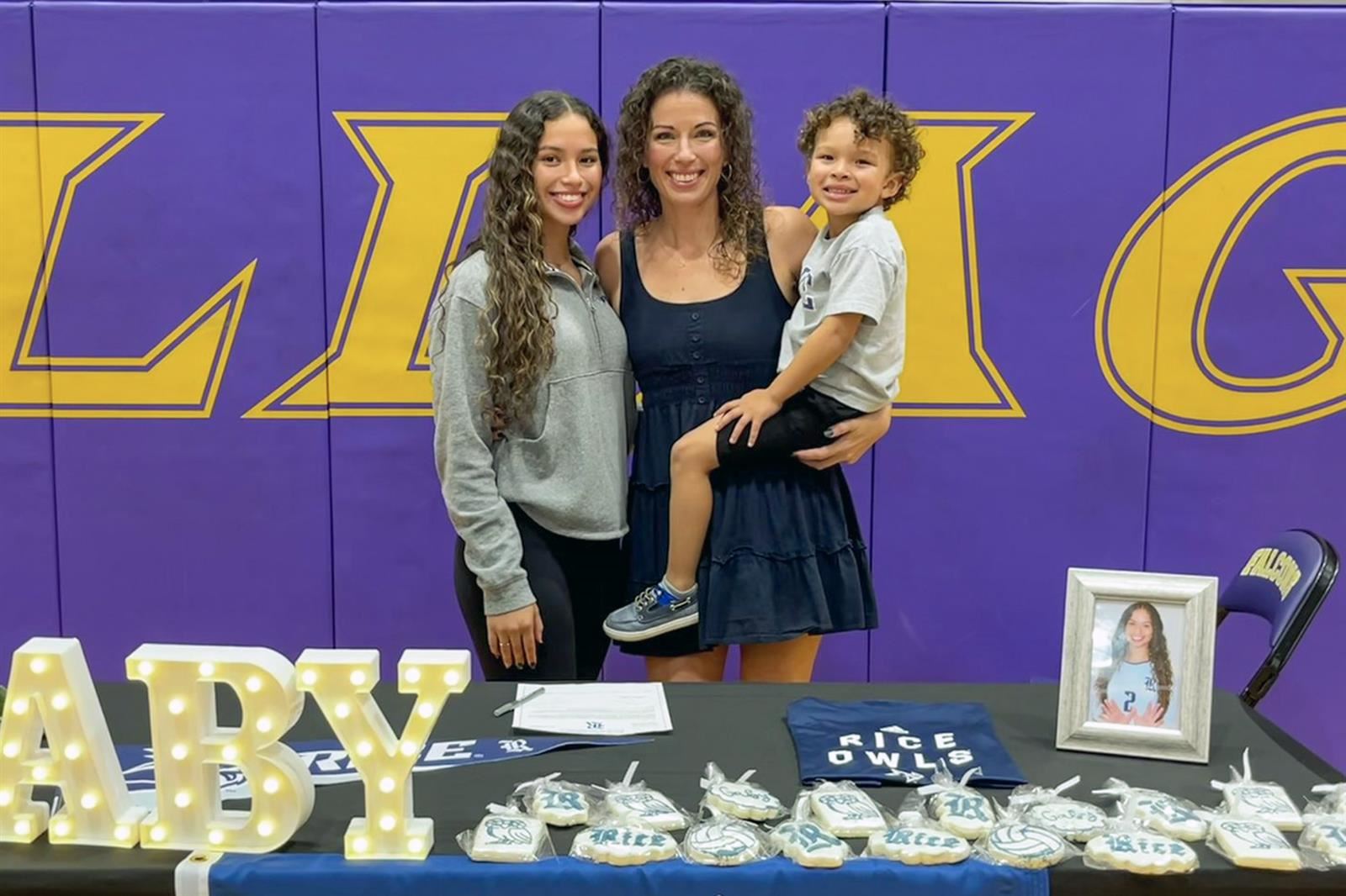 Jersey Village High School senior Gabriela Mansfield, left, signed a letter of intent to play volleyball at Rice University.